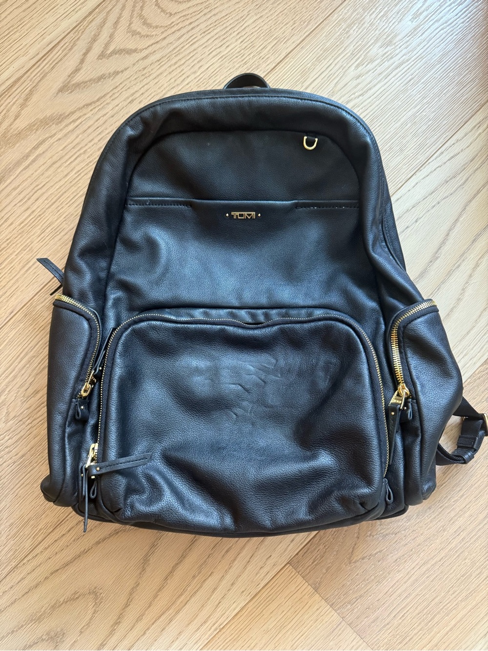 Tumi Black Leather Backpack with Gold Hardware
